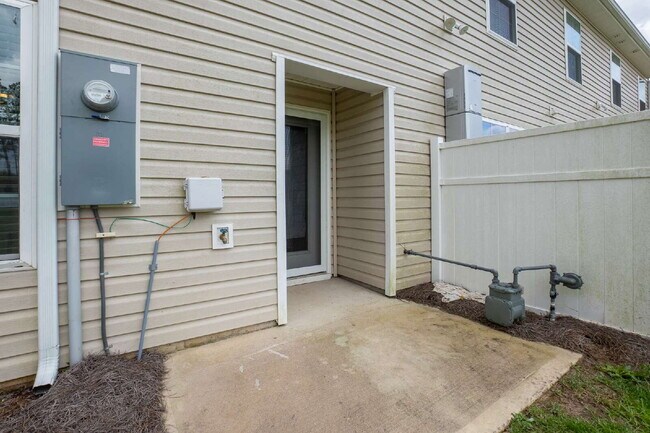 Building Photo - Partially furnished and now available!