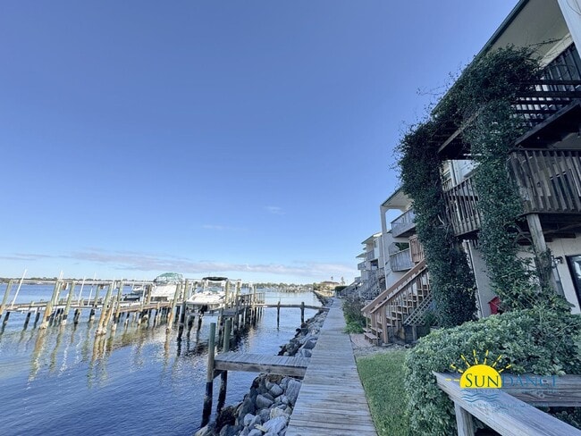 Building Photo - Waterfront Luxury Living on Garniers Bayou with Boat Slip/Lift Included!
