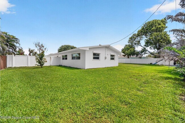 Building Photo - Welcome to this beautifully remodeled 4-bedroom, 3-bath home in the heart of Indialantic Beach!