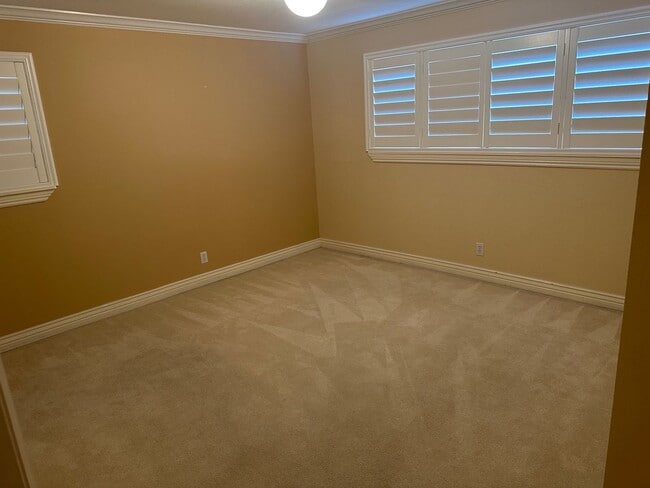 Building Photo - Spacious Millcreek Townhome with Two Living Areas, Private Deck & Community Amenities