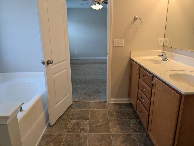 Building Photo - Pristine, move in ready Home located in th...
