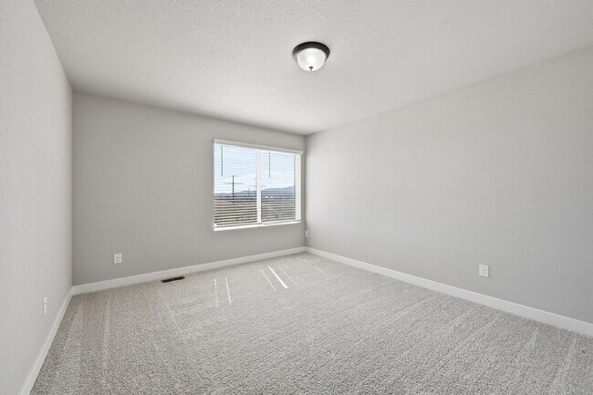 Building Photo - $2,340.95, 3 bed, 2.5 bath located in Colorado Springs with a fenced back yard