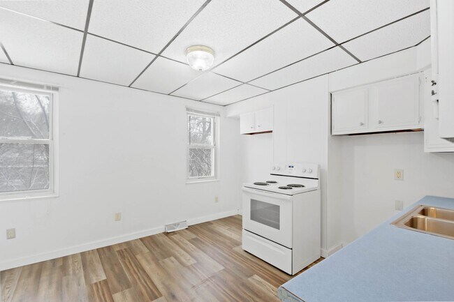 Building Photo - JUST LOWERED! EXPERIENCE THE ULTIMATE SAVI...