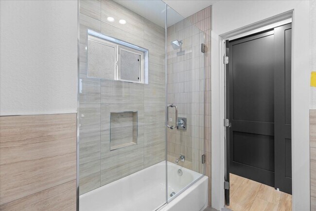 Building Photo - COMPLETELY REMODELED, BRIGHT & AIRY, TRI-LEVEL HOME W/ TOP-FLOOR GREAT ROOM LIVING SPACE, 2-CAR G...