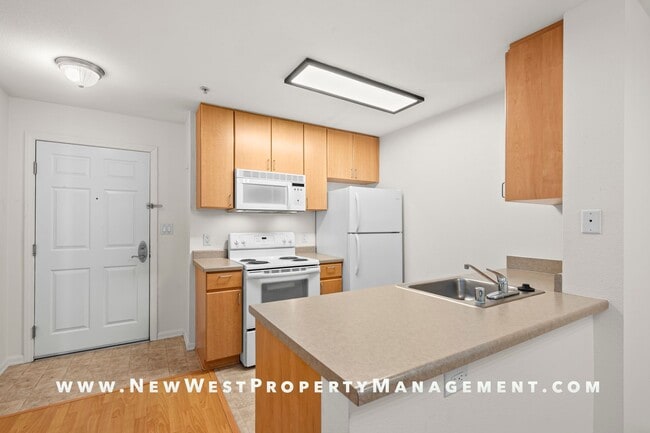 Building Photo - Charming Little Italy 1-Bedroom at Portico! Small Pet OK! Available Now!