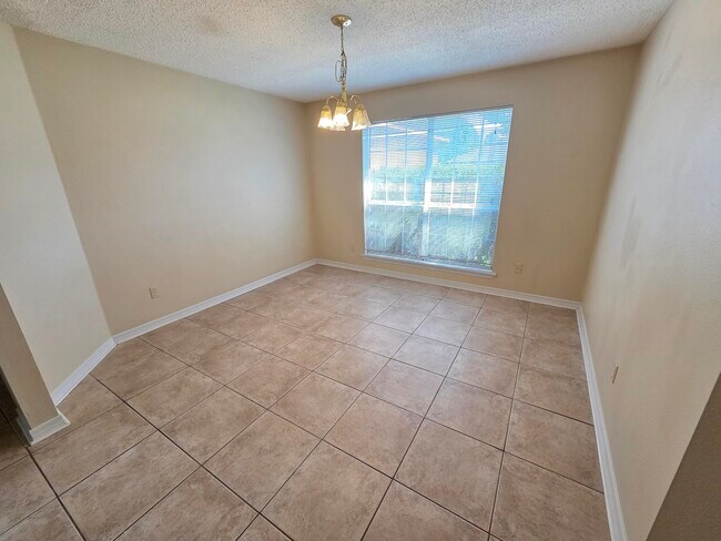 Building Photo - 7436 Woodmont Rd