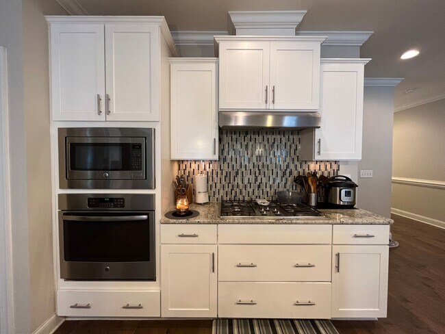 Building Photo - Exceptional 4BD, 2.5BA Cary Townhome with 2-Car Garage, Bonus 2nd Floor Living Space, and Private...