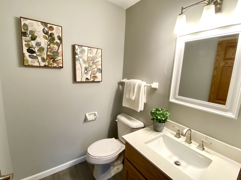 1/2 Bath with New Vanity, Flooring - N89W15976 Main St