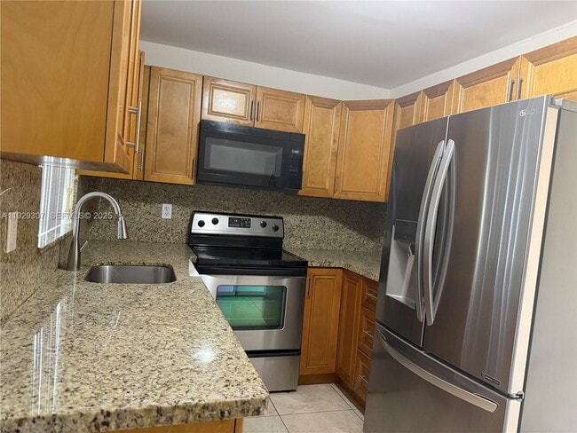 Building Photo - 6085 W Flagler St