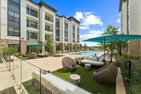 Enjoy sunny days relaxing by the resort-style pool - Elina