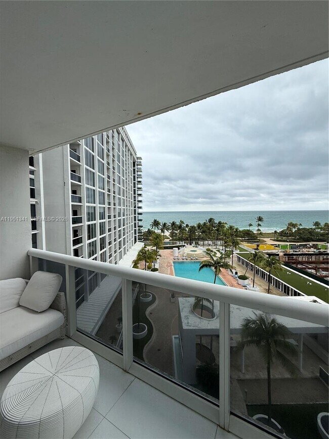 Building Photo - 10275 Collins Ave