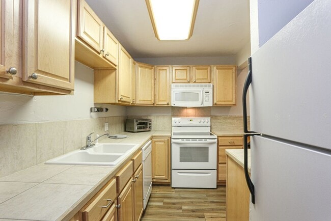 Building Photo - Walk to everything! Partially Furnished! Flexible lease terms!