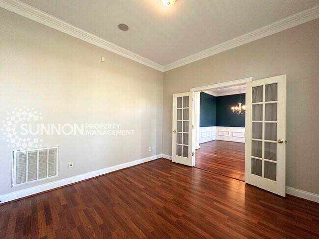 Building Photo - Wooded, Charming 3 Bedroom with Tons of Space