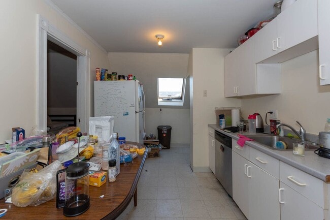 Building Photo - No Brokers Fee, Heat and Hot Water Included, Top Floor Unit, Steps from the T Stop, Eat-in Kitche...