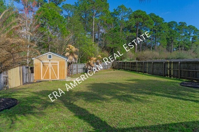 Building Photo - Charming 4 BR, 2 BA Home with Oversized Sc...