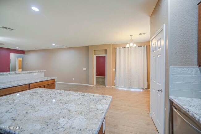Building Photo - 6826 W Charter Oak Rd