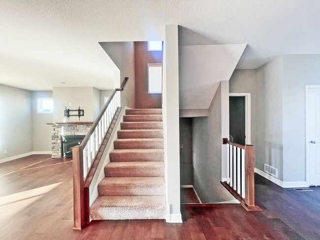 Building Photo - Sparkling Like-New 2-story w/ Full Walkout on Pond with Office-Bedroom 6, Pets OK!