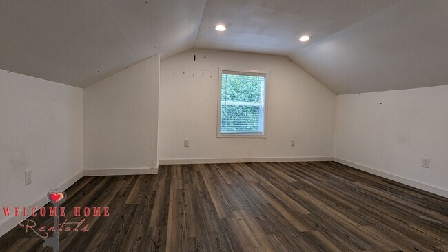 Building Photo - 4 bedroom home with air conditioning - Great location!!!  HUGE basement for your man cave or she ...