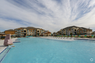 Our Luxury Resort Style Swimming Pool with a Cabana and Fireplace! We have Aqua Loungers inside the pool with a beach inlet entrance - Biltmore At The Park
