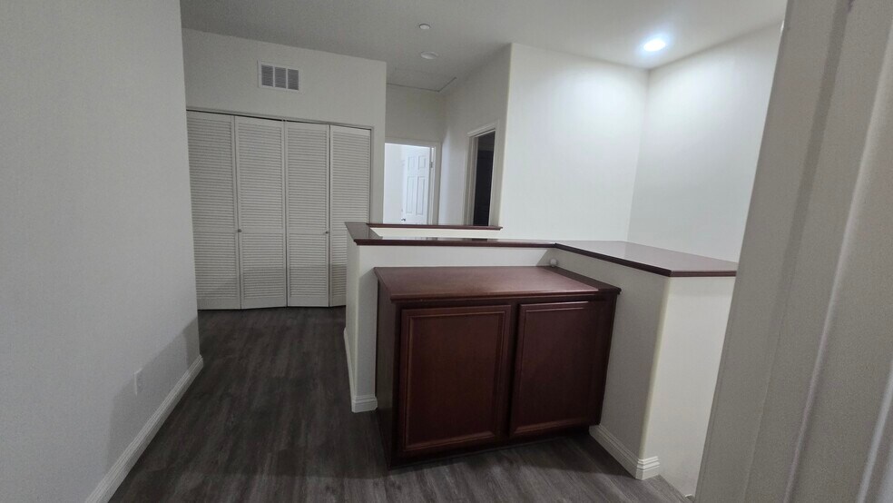 Upstairs laundry and storage - 146 Martindale Way