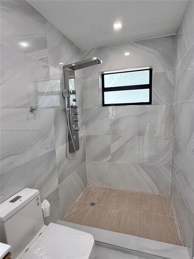 Building Photo - 12615 N Miami Ave