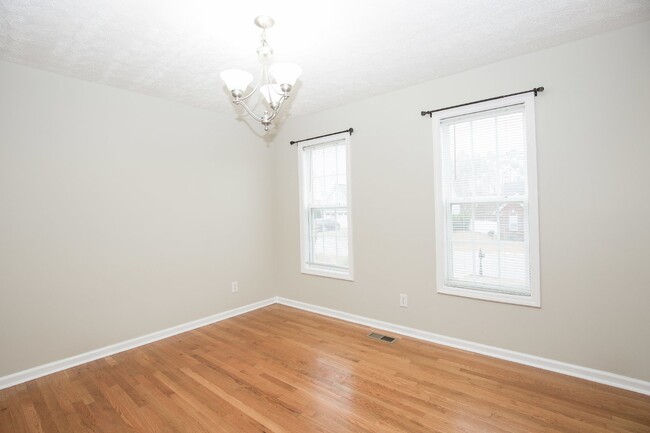 Building Photo - "Charming 4-Bedroom Home with Granite Coun...