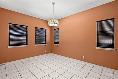 Building Photo - Large 2 story home with refrigerated air, huge backyard and Pets are Allowed.