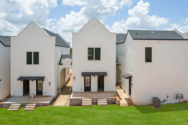 Building Photo - Bright. Clean. Calm. Your Elevated One-Bed...