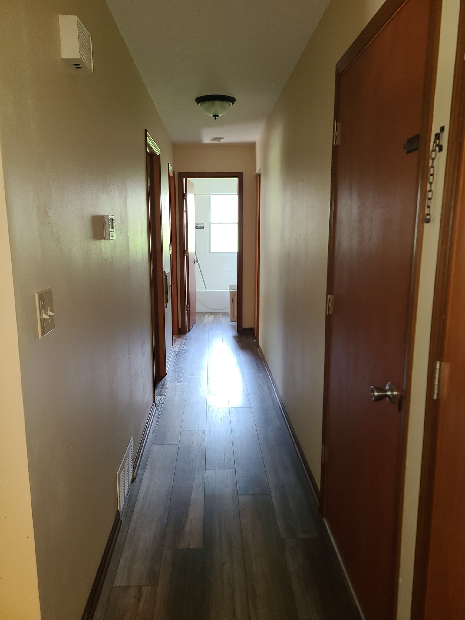 Hallway to bedrooms and bathroom - 220 S Jefferson St