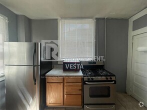 Building Photo - Charming One Bedroom Apartment