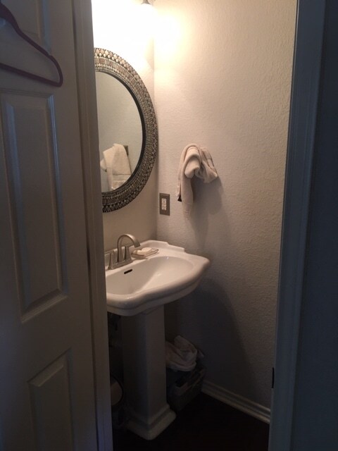 1/2 bath downstairs off family room - 3809 Willie Mays Ln