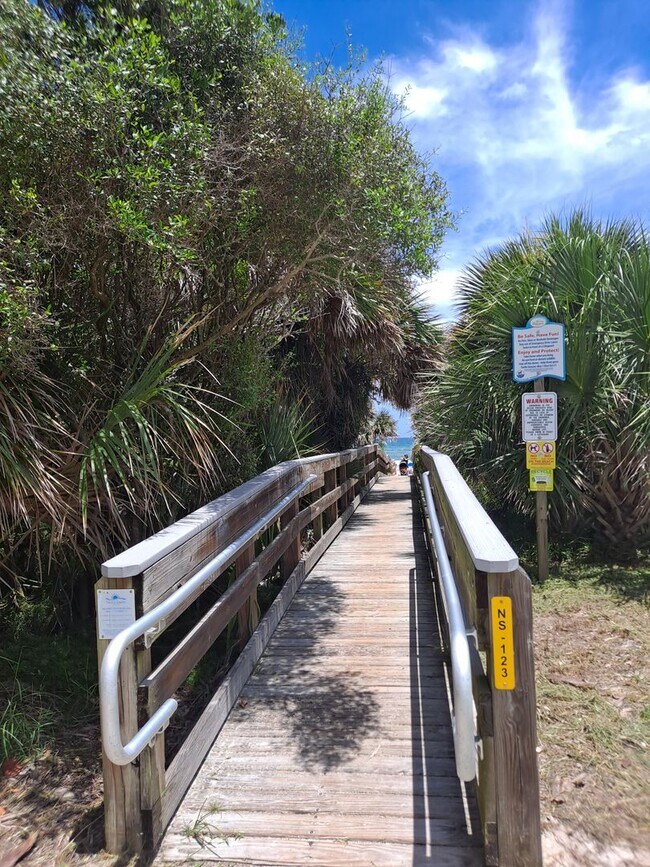 Building Photo - BEACHSIDE NSB FURNISHED RENTAL AVAILABLE MONTHLY!