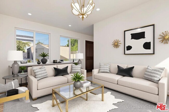 Building Photo - 144 S La Peer Dr