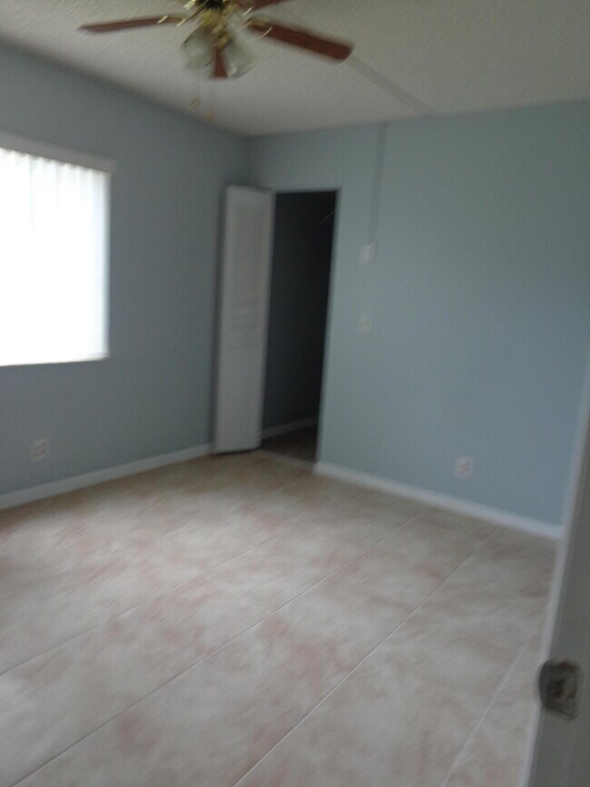 Building Photo - 5860 Whispering Pine Way