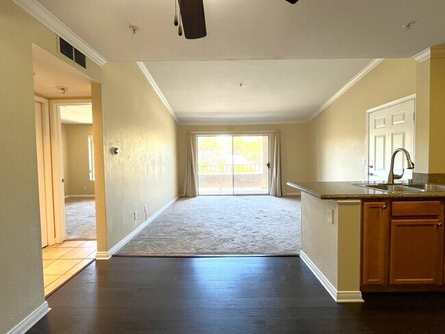 Building Photo - 1BR Condo with Private Balcony, Central A/C & Community Amenities in Corona