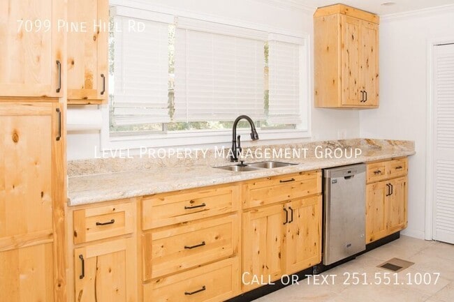 Building Photo - 7099 Pinehill Rd