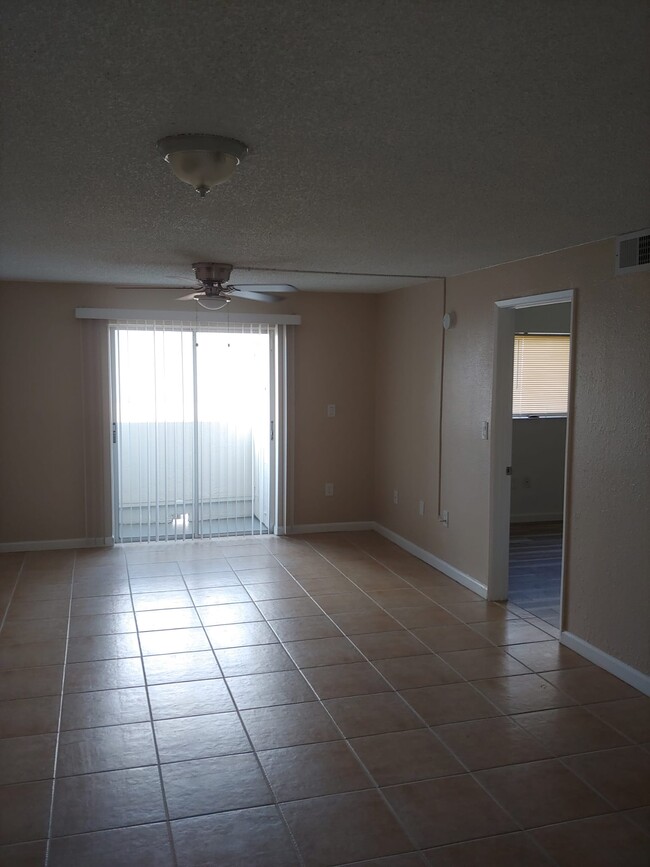 Living room towards master bedroom - 6130 W 21st Ct