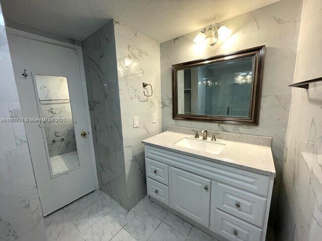 Building Photo - 4275 NW S Tamiami Canal Dr
