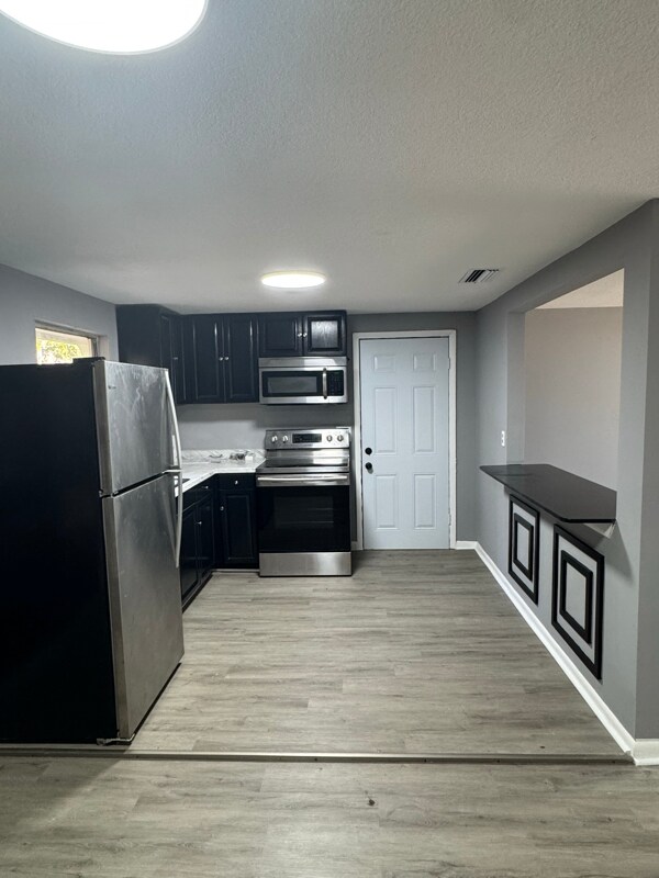 Building Photo - 5253 Kylan Dr N