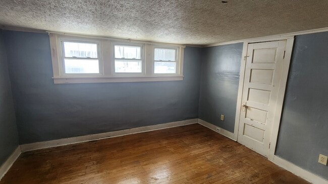 Building Photo - Cozy 3 bedroom Cape Cod with attached garage! First floor offers living room, formal dining, and ...