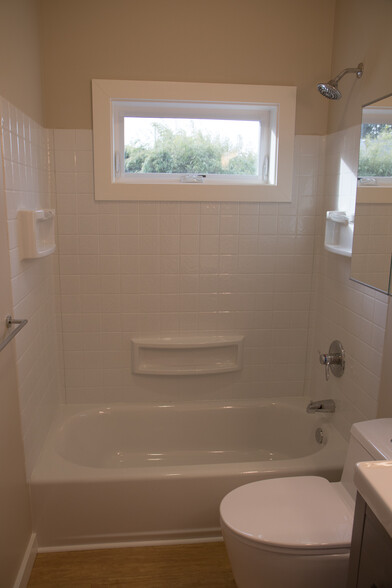 Bathtub with privacy window. - 5239 NE Mason St