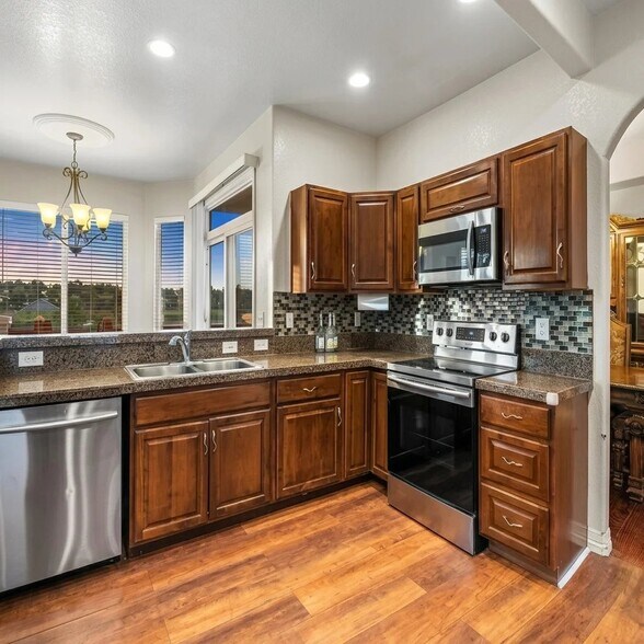 Building Photo - 3243 E 94th Dr
