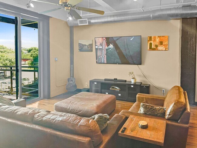 Building Photo - Modern Downtown Condo with Stunning City V...