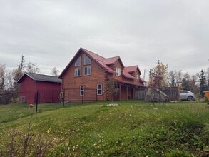 Building Photo - Gorgeous Log Home with infloor heat.  Two level lots with RV parking and dumpstation.