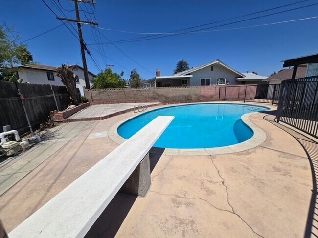 Building Photo - Summer-Ready Pool Home in Pomona