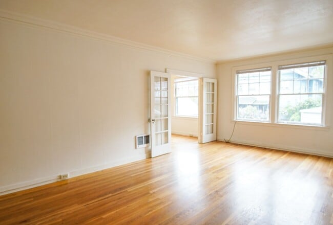 Building Photo - Ladd's Addition: Sunny Studio with Hardwoods + Lovely Architectural Appeal!