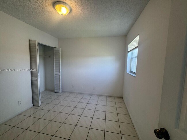Building Photo - 7410 Woodmont Terrace