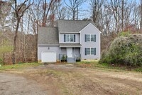 Building Photo - 4-bedroom, 2.5 bath with wooded view!