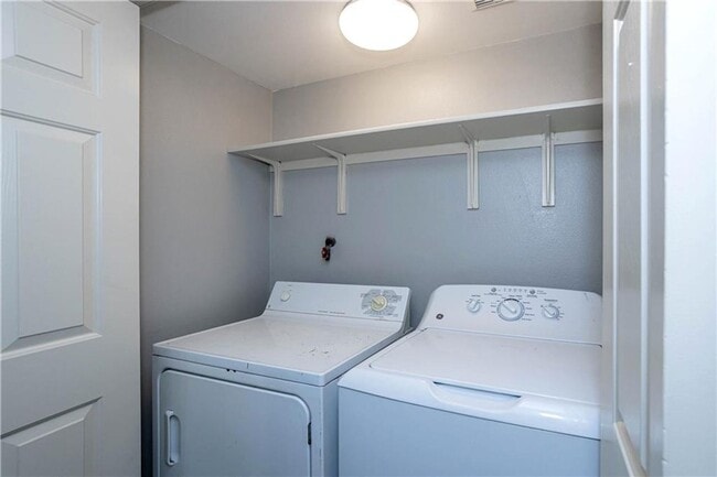 Building Photo - Stunning Renovation - New Hardwood flooring, tile in Kitchen. Granite countertops, breakfast bar