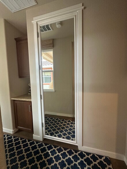 Mirror hiding door from Main House to Studio - locked from your bathroom, studio is private - 2534 Napier Ct